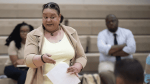 Gary Advocates for Responsible Development co-founder Kimmie Gordon speaks to IDEM employees during a public meeting to discuss the renewal of Carmeuse Lime's operating permit in Gary on Thursday, June 1, 2023. (Kyle Telechan for the Post-Tribune)
