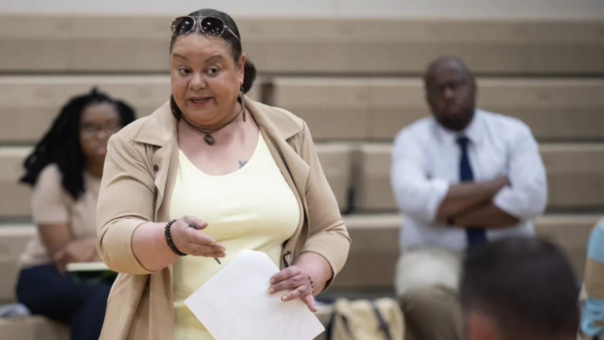 Gary Advocates for Responsible Development co-founder Kimmie Gordon speaks to IDEM employees during a public meeting to discuss the renewal of Carmeuse Lime's operating permit in Gary on Thursday, June 1, 2023. (Kyle Telechan for the Post-Tribune)